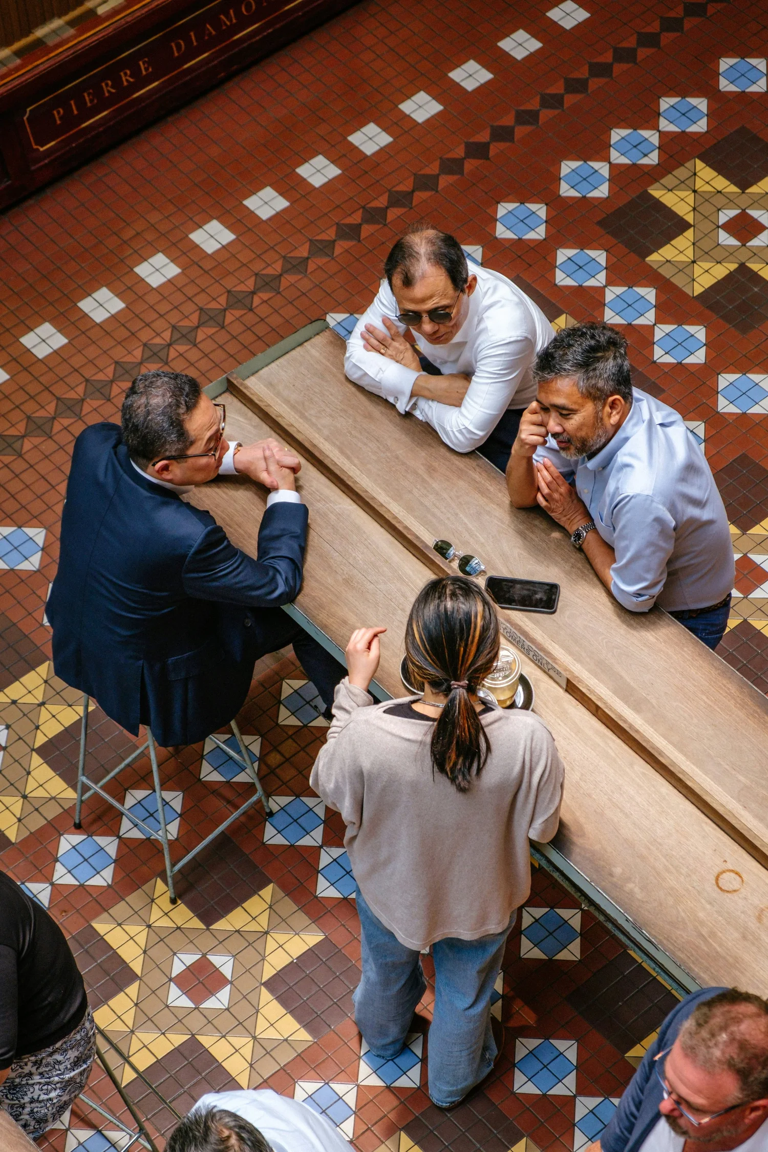 Research professionals collaborating around a table